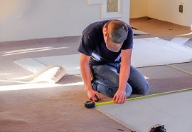 measuring floor for carpet installation