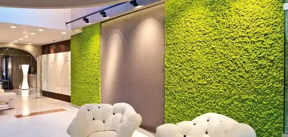 Modern lobby featuring two white tufted armchairs