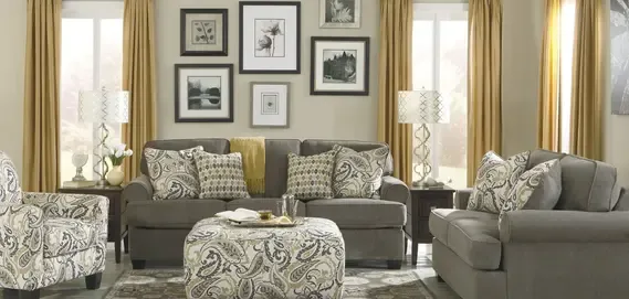 Stylish living room with gray sofas, decorative pillows